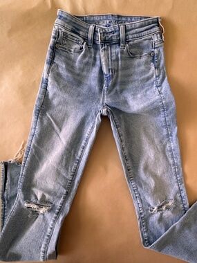 American Eagle Next Level Stretch Light Wash Jeans with Knee Rips Raw Hem 00